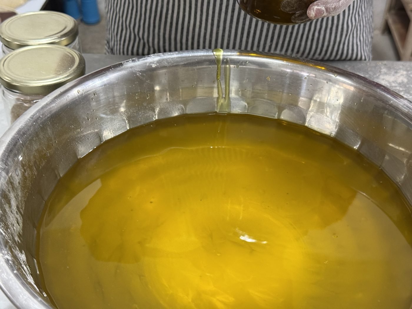 Oil poured into a steel bowl